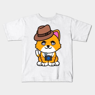 Cute orange cat is holding a camera Kids T-Shirt